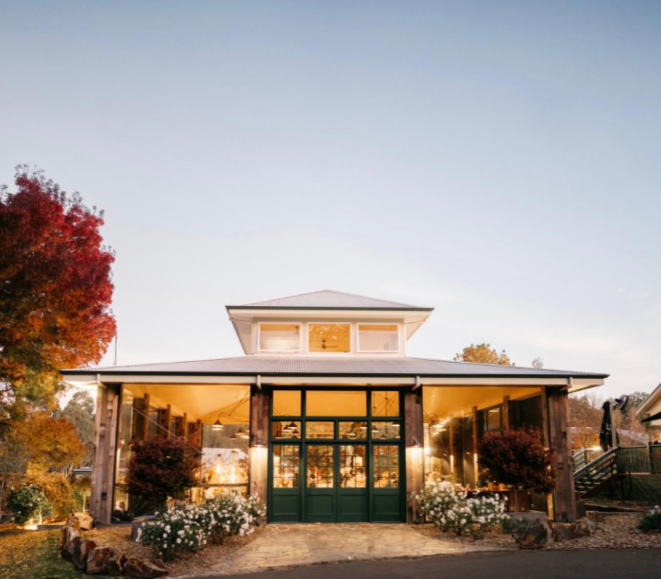The Flowerdale Estate pavilion glowing at dusk